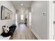 Inviting hallway with modern vinyl floors, neutral paint, and stylish decor, creating a welcoming entrance to the home at 4804 Brouse Ave, Indianapolis, IN 46205