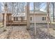 Backyard view showcasing the deck and siding at 4947 Cherryhill Ct, Indianapolis, IN 46254