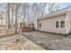 Backyard with a deck and mature tree coverage at 4947 Cherryhill Ct, Indianapolis, IN 46254