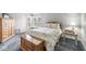 Well-lit bedroom with soft tones, a comfortable bed, and ample natural light at 4947 Cherryhill Ct, Indianapolis, IN 46254