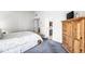 Comfortable bedroom with a peek into the ensuite bathroom and featuring ample closet space at 4947 Cherryhill Ct, Indianapolis, IN 46254