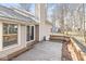 Wooden deck with partial view of the house and trees at 4947 Cherryhill Ct, Indianapolis, IN 46254