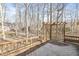 Wooden deck with a built in pergola and bench at 4947 Cherryhill Ct, Indianapolis, IN 46254