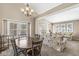 Cozy living room with large windows and a comfortable seating area at 4947 Cherryhill Ct, Indianapolis, IN 46254