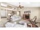 Open-concept living room featuring a high ceiling, open staircase, and a cozy seating area at 4947 Cherryhill Ct, Indianapolis, IN 46254