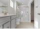 This bathroom features a double vanity with a shower with glass doors at 5147 Gerhing Dr, Indianapolis, IN 46239