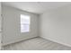 A cozy bedroom with soft gray carpet, perfect for relaxation and rest at 5147 Gerhing Dr, Indianapolis, IN 46239