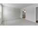 This bedroom features neutral paint, carpet and trim, plus an ensuite bathroom at 5147 Gerhing Dr, Indianapolis, IN 46239
