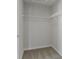 A walk in closet with neutral carpet and wire shelving at 5147 Gerhing Dr, Indianapolis, IN 46239