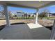 Welcoming covered patio provides the perfect setting for outdoor enjoyment with scenic neighborhood views at 5147 Gerhing Dr, Indianapolis, IN 46239