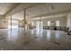 Spacious unfinished basement with staircase and high ceilings providing ample room for storage at 5752 River Rd, Waldron, IN 46182