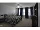 Bedroom features large windows, neutral carpet, and ample natural light at 5810 Grand Ave, Plainfield, IN 46168