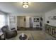 Relaxing living room with a large window, elegant furnishings, and a welcoming atmosphere at 5810 Grand Ave, Plainfield, IN 46168