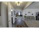 Inviting living room featuring stylish decor, plush carpeting, and seamless transition into adjacent spaces at 5810 Grand Ave, Plainfield, IN 46168