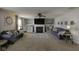 Large living room with fireplace, modern furnishings, and plenty of room for relaxing and entertaining at 5810 Grand Ave, Plainfield, IN 46168