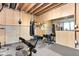 Well-equipped basement gym featuring weights, punching bags, and exercise equipment in a finished space at 6504 W May Apple Dr, McCordsville, IN 46055