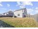 Large, fenced backyard with patio, outdoor seating, and privacy at 6705 Park Grove Blvd, Whitestown, IN 46075