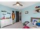 Brightly-decorated bedroom offering fun decor, a ceiling fan, and comfortable furnishings at 6705 Park Grove Blvd, Whitestown, IN 46075