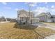 Inviting two-story home with attached two car garage, covered porch and well-kept landscaping at 6705 Park Grove Blvd, Whitestown, IN 46075
