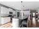 Beautiful kitchen island with seating, granite countertops, stainless steel appliances, and plenty of cabinet space at 6705 Park Grove Blvd, Whitestown, IN 46075