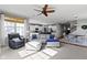 Inviting living space featuring an open layout, lots of natural light, and seamless transition to dining and kitchen areas at 6705 Park Grove Blvd, Whitestown, IN 46075
