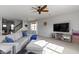 Spacious living room showcasing a cozy sectional sofa, neutral walls, and hardwood flooring, offering comfort and style at 6705 Park Grove Blvd, Whitestown, IN 46075