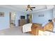 Spacious main bedroom with en-suite bath and black doors creates a luxurious retreat at 6705 Park Grove Blvd, Whitestown, IN 46075