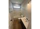 Bright bathroom with a tub and shower combination, neutral color palette and modern vanity at 7227 Bailow Ct, McCordsville, IN 46055