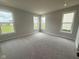 Spacious bedroom featuring natural light and a neutral color palette, ideal for relaxation at 7227 Bailow Ct, McCordsville, IN 46055