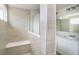 Bright bathroom featuring a tiled shower with bench and glass enclosure next to a vanity at 815 Allandale Ave, Westfield, IN 46074