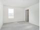 Bedroom with carpet, natural light from a window, and a doorway to another room at 815 Allandale Ave, Westfield, IN 46074