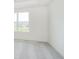 Sunlit carpeted bedroom with windows and neutral walls at 815 Allandale Ave, Westfield, IN 46074