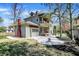 A backyard with lush green grass, concrete patio and home exterior at 828 Woodruff Place Middle Dr, Indianapolis, IN 46201