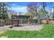 Backyard featuring a wooden play structure and well-maintained lawn at 828 Woodruff Place Middle Dr, Indianapolis, IN 46201