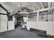 Unfinished basement with exposed ductwork, utilities, and a framed section at 828 Woodruff Place Middle Dr, Indianapolis, IN 46201