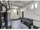 View of unfinished basement space with concrete floor and exposed pipes at 828 Woodruff Place Middle Dr, Indianapolis, IN 46201