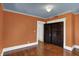 Bedroom featuring hardwood floors, a large window, and a closet with sliding doors at 828 Woodruff Place Middle Dr, Indianapolis, IN 46201