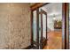Elegant entryway showcasing decorative wallpaper and intricate woodwork at 828 Woodruff Place Middle Dr, Indianapolis, IN 46201