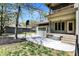 Charming home with a basketball court, lush landscaping, and a detached garage at 828 Woodruff Place Middle Dr, Indianapolis, IN 46201
