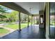 Spacious front porch featuring elegant columns and scenic neighborhood views at 828 Woodruff Place Middle Dr, Indianapolis, IN 46201