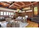 Inviting living room with wood beams, paneled walls, and a comfortable seating area at 828 Woodruff Place Middle Dr, Indianapolis, IN 46201