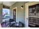 Inviting porch with seating, offering a relaxing outdoor space with natural light at 828 Woodruff Place Middle Dr, Indianapolis, IN 46201