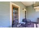 Cozy porch with chairs, perfect for relaxing and enjoying the neighborhood views at 828 Woodruff Place Middle Dr, Indianapolis, IN 46201