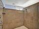Spacious walk-in shower with tiled walls, multiple shower heads, and a white tiled floor at 828 Woodruff Place Middle Dr, Indianapolis, IN 46201