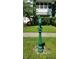 An eye-catching green horse head lawn ornament is a unique feature of this property at 828 Woodruff Place Middle Dr, Indianapolis, IN 46201