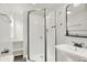 Modern bathroom with glass-enclosed shower and updated fixtures at 952 N Concord St, Indianapolis, IN 46222