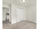 Comfortable bedroom adjacent to the kitchen area for easy access at 952 N Concord St, Indianapolis, IN 46222