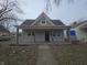 Charming one-story home with a covered front porch and welcoming facade at 952 N Concord St, Indianapolis, IN 46222