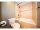 Inviting bathroom with tiled shower and tub combo and modern fixtures at 10120 Fox Trce, Zionsville, IN 46077