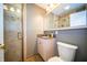 Contemporary bathroom featuring a walk-in shower and a modern vanity sink at 10120 Fox Trce, Zionsville, IN 46077